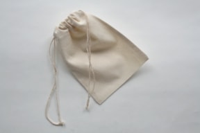 SET 12 UNBLEACHED COTTON BAGS 10.5X15CM